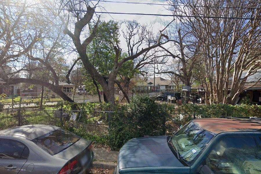 5035 Linder Avenue Dallas, TX 75215 - Photo 2 of 2 a backyard of a house with lots of green space