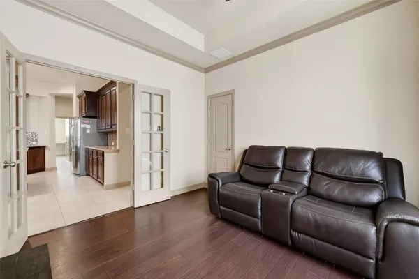 a view of a dining room with furniture and a window