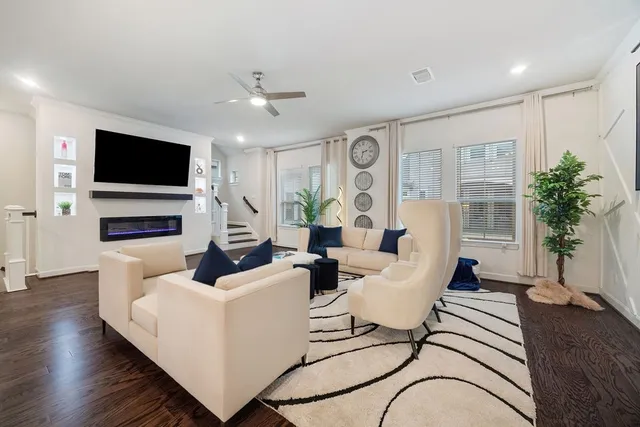 a large kitchen with stainless steel appliances granite countertop a lot of counter space and a sink