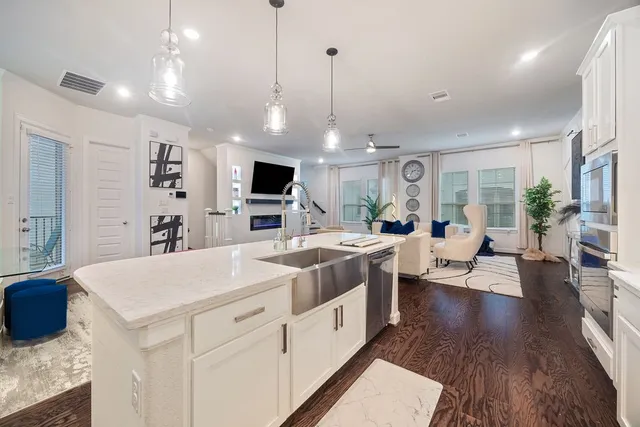 a view of a chairs and table in the balcony
