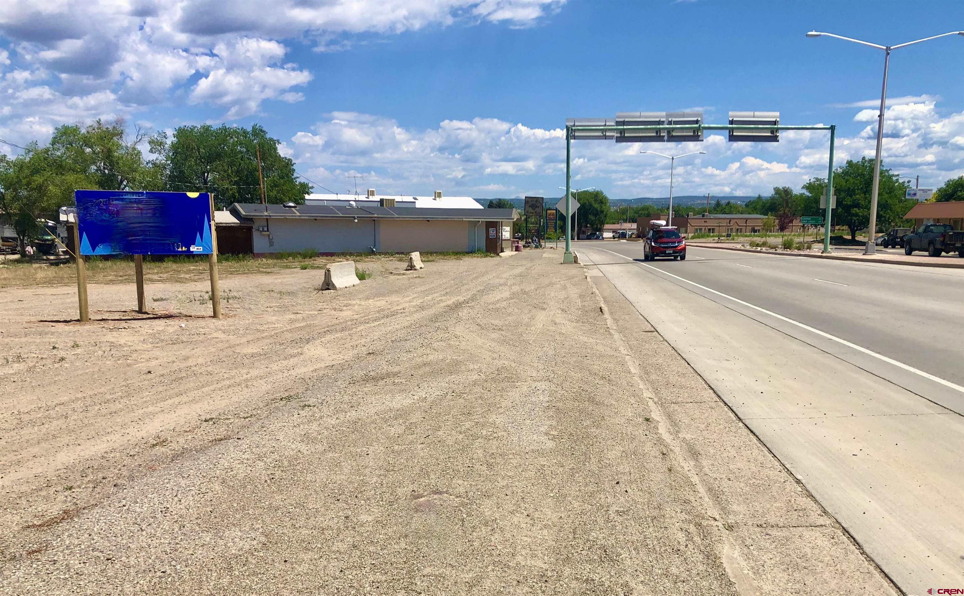 409 North Broadway Cortez, CO 81321 - Photo 1 of 13 a view of the street with a fire pit