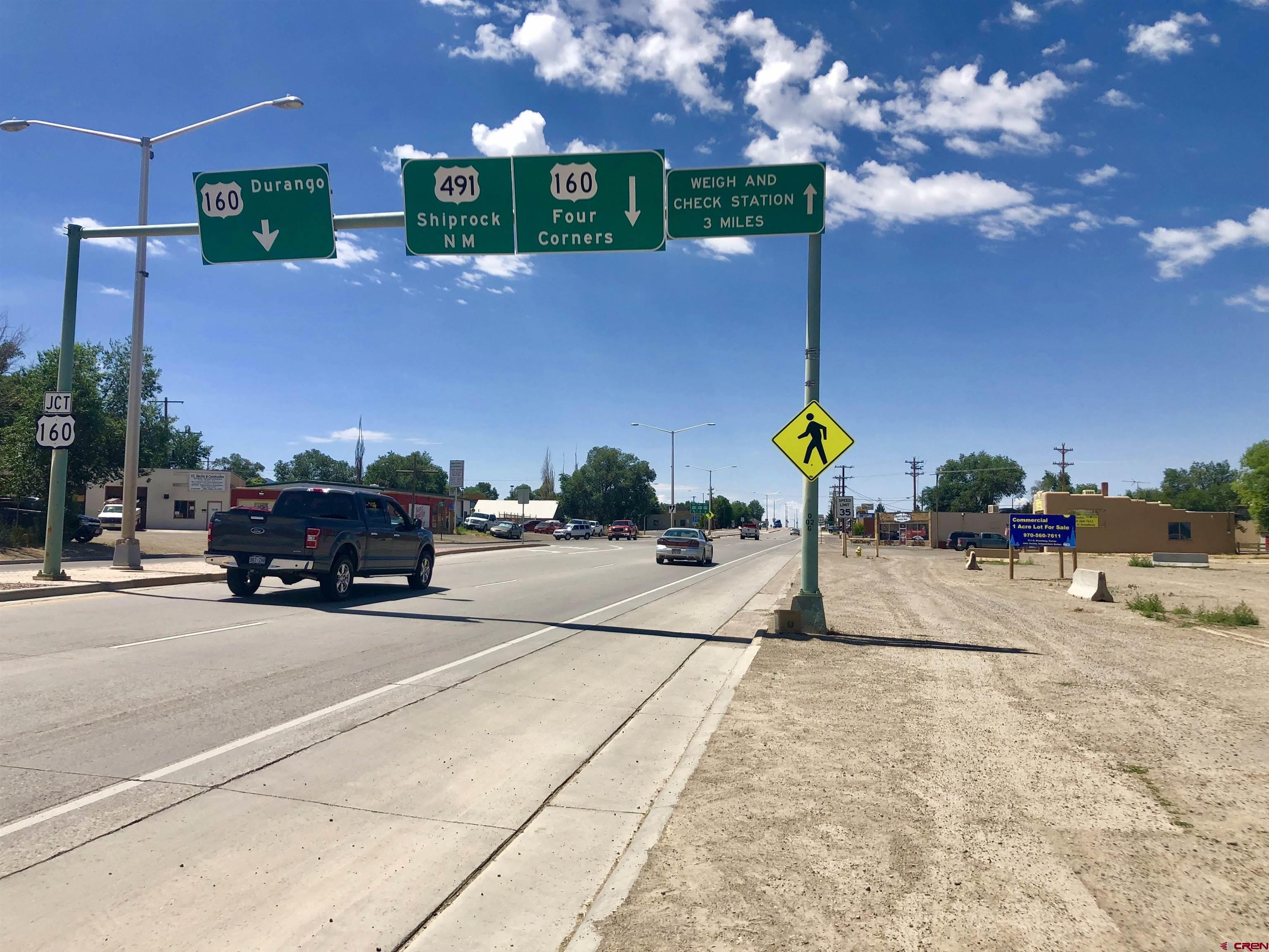 409 North Broadway Cortez, CO 81321 - Photo 3 of 13 a view of a street with cars