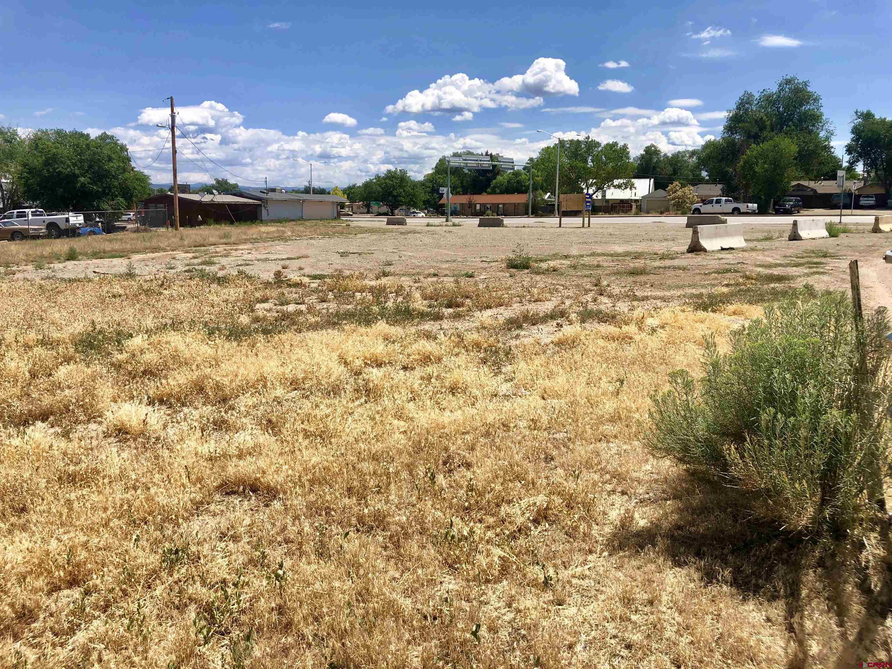 409 North Broadway Cortez, CO 81321 - Photo 10 of 13 a view of a lake with a houses