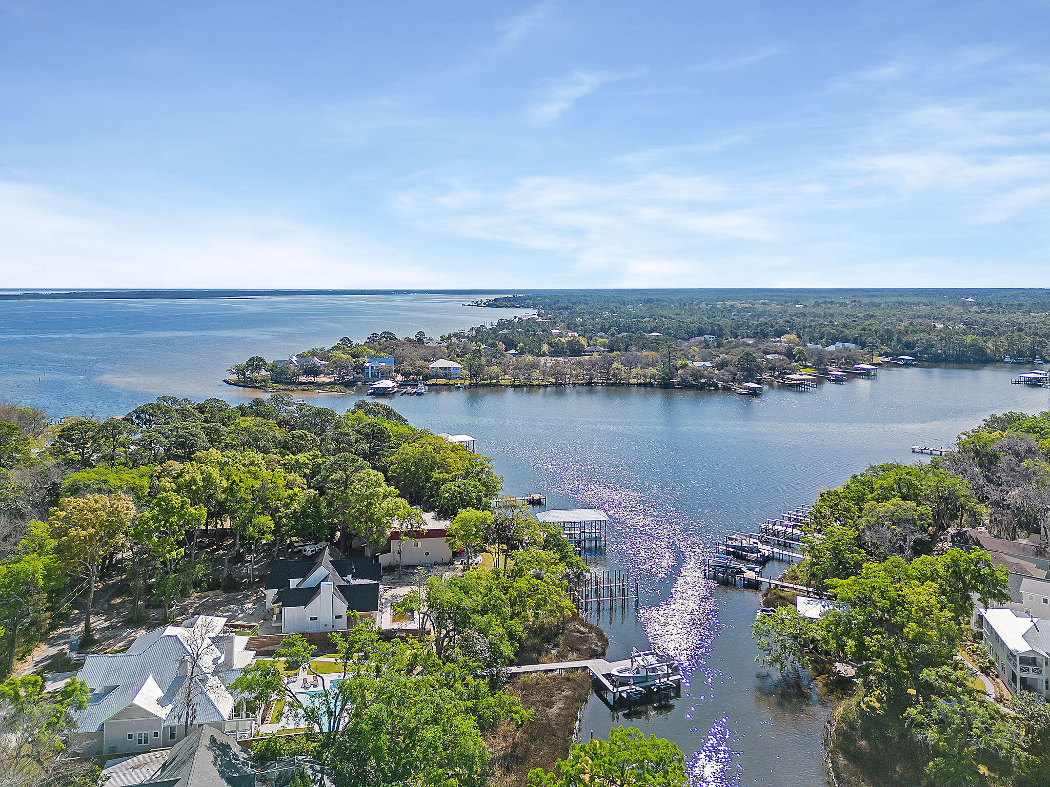 164 Rearden Way Santa Rosa Beach, FL 32459 - Photo 4 of 54 an aerial view of a city with lots of residential buildings and lake view in back