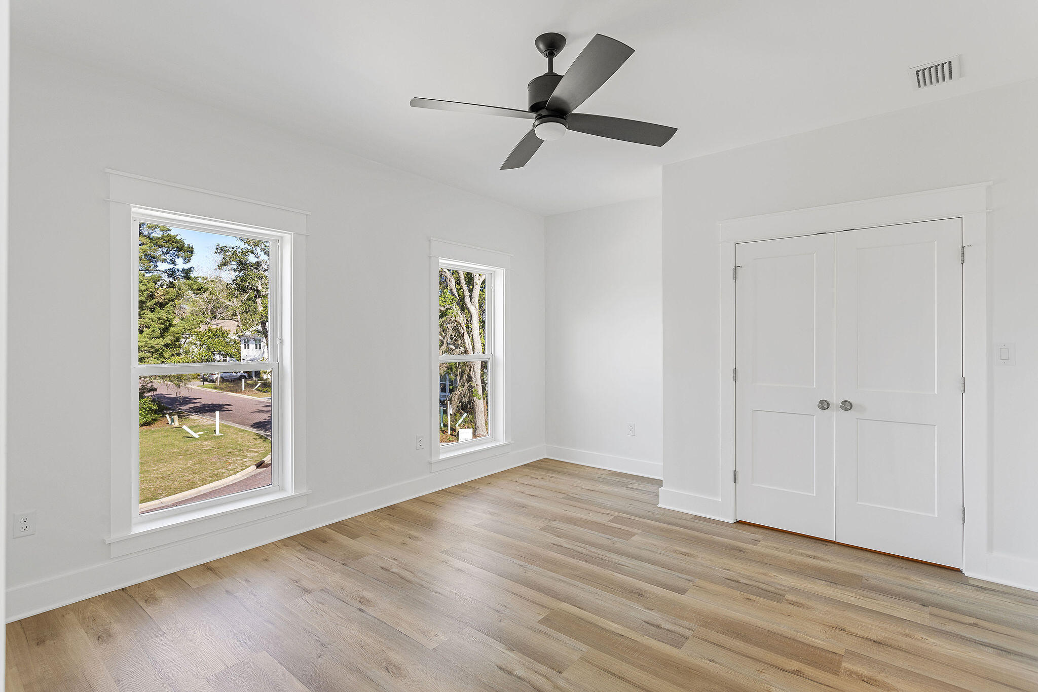 164 Rearden Way Santa Rosa Beach, FL 32459 - Photo 47 of 54 a view of empty room with wooden floor and fan