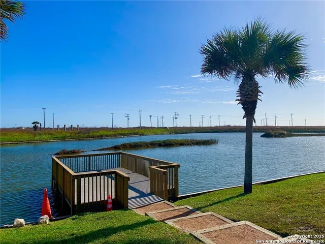 a view of swimming pool with a yard
