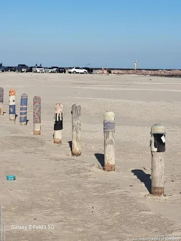 a view of a water heater and a sink