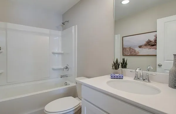 a bathroom with a sink toilet and a bathtub