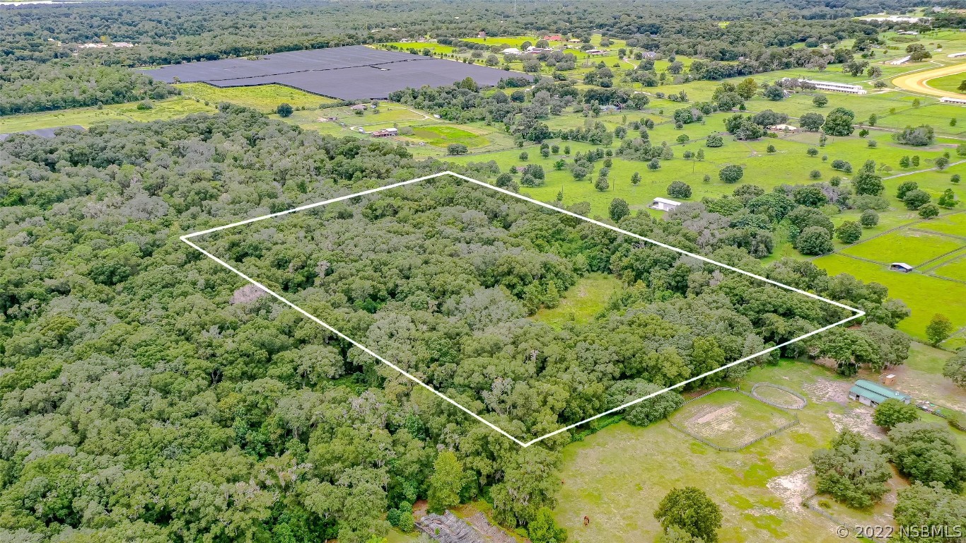 0 Reynolds Road De Leon Springs, FL 32130 - Photo 4 of 12 a view of a tennis court