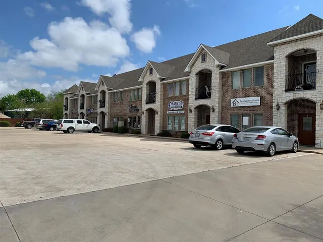 a car parked in front of a building