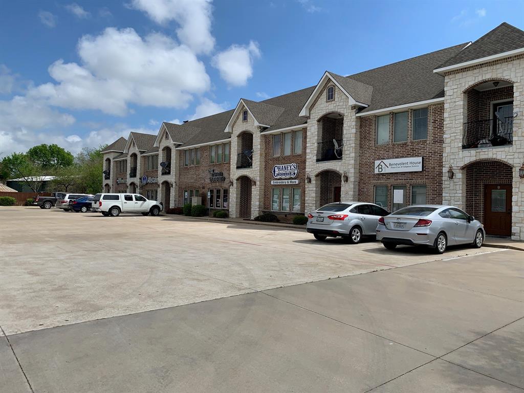 a car parked in front of a building