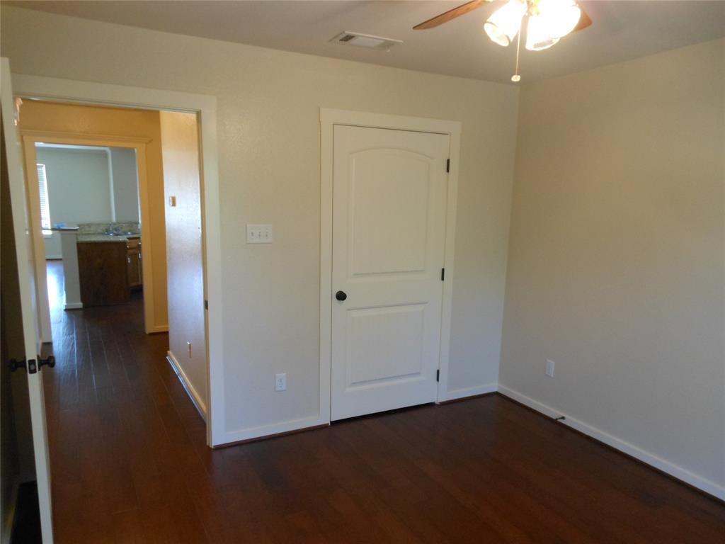 206 Highway 342, Unit K Red Oak, TX 75154 - Photo 14 of 14 wooden floor in an empty room
