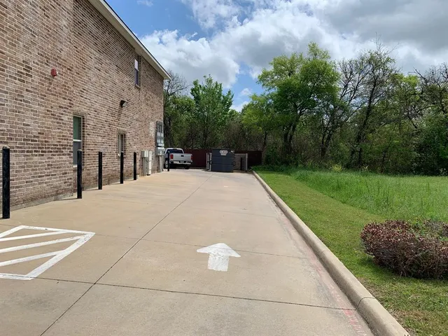 a swimming pool with wooden fence