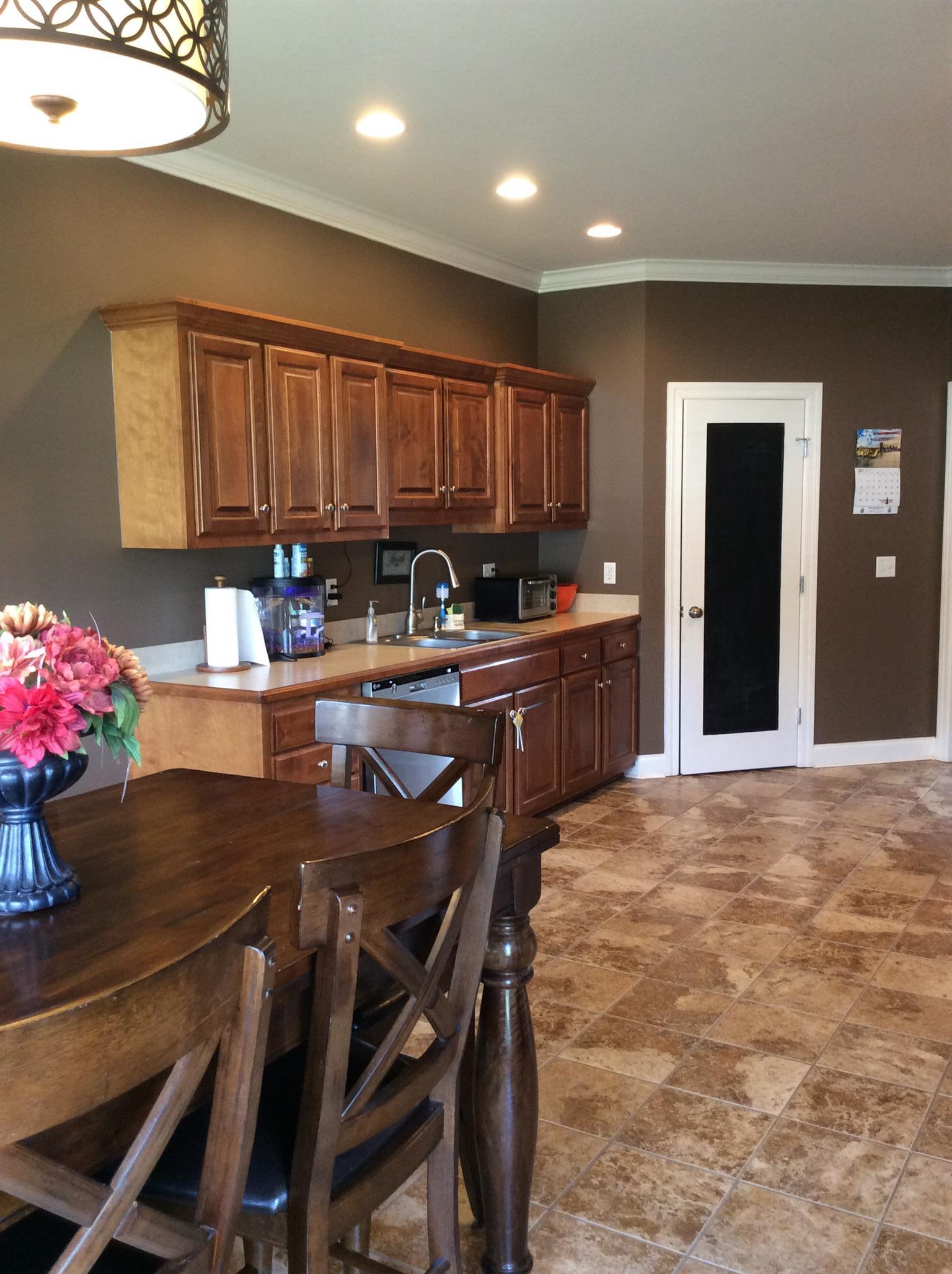 206 Hunters Ridge Drive Tullahoma, TN 37388 - Photo 11 of 18 Newer dishwasher and brand new faucet. The pantry is very large