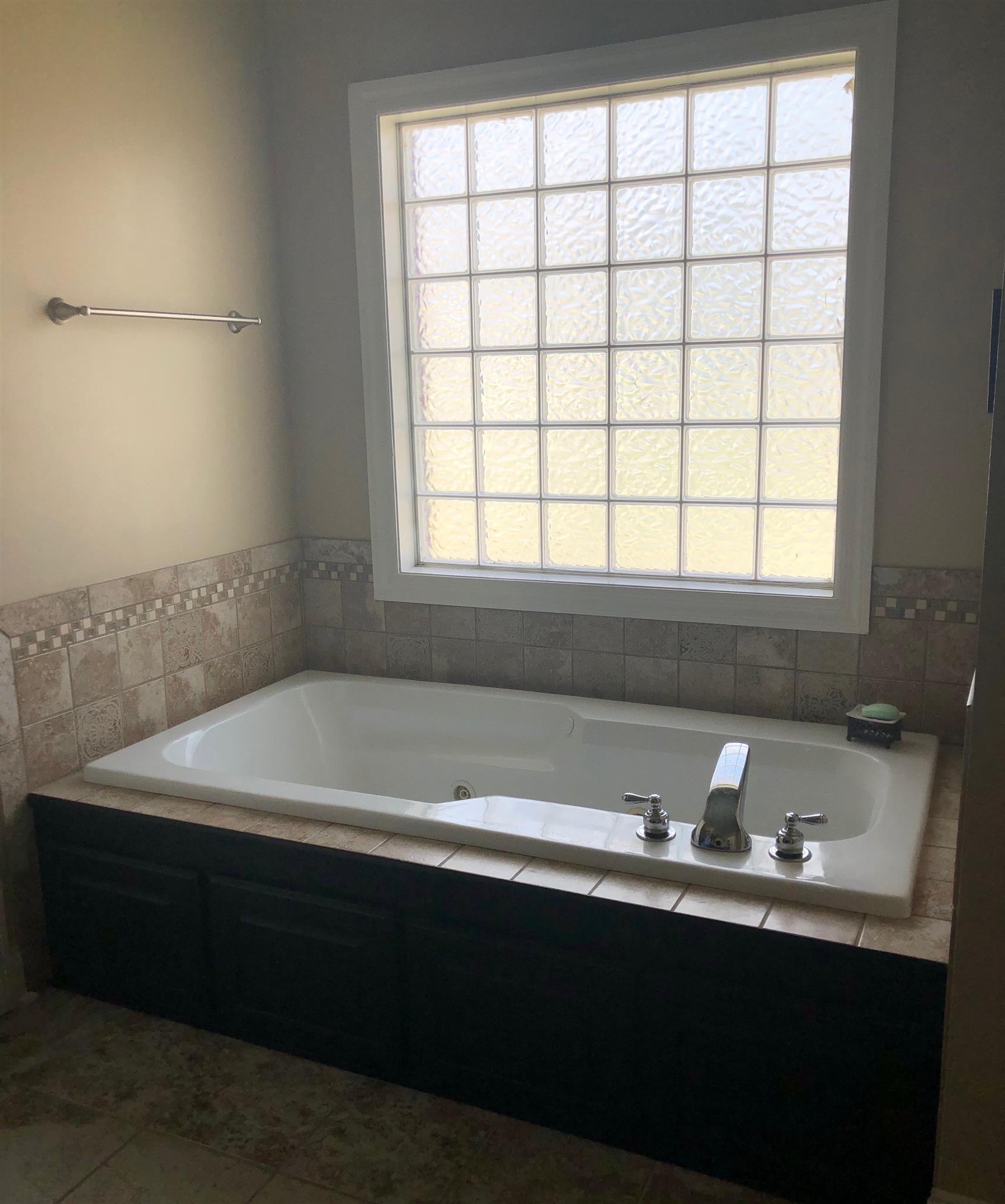 206 Hunters Ridge Drive Tullahoma, TN 37388 - Photo 13 of 18 Separate tub and shower as well as a huge walk in closet set this bathroom apart