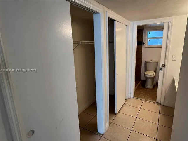 a bathroom with a sink and toilet