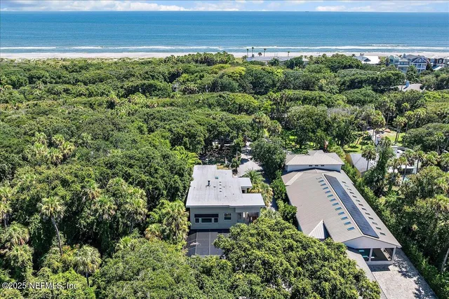 a living room with fireplace furniture and a flat screen tv