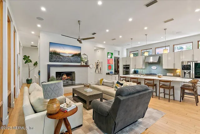 a view of a backyard with sitting area