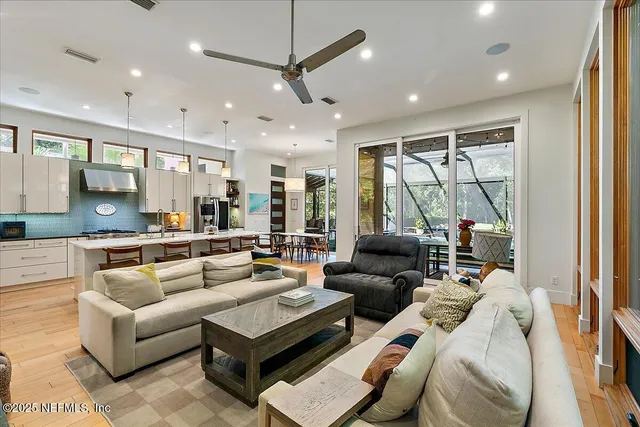 a view of a field with trees in the background