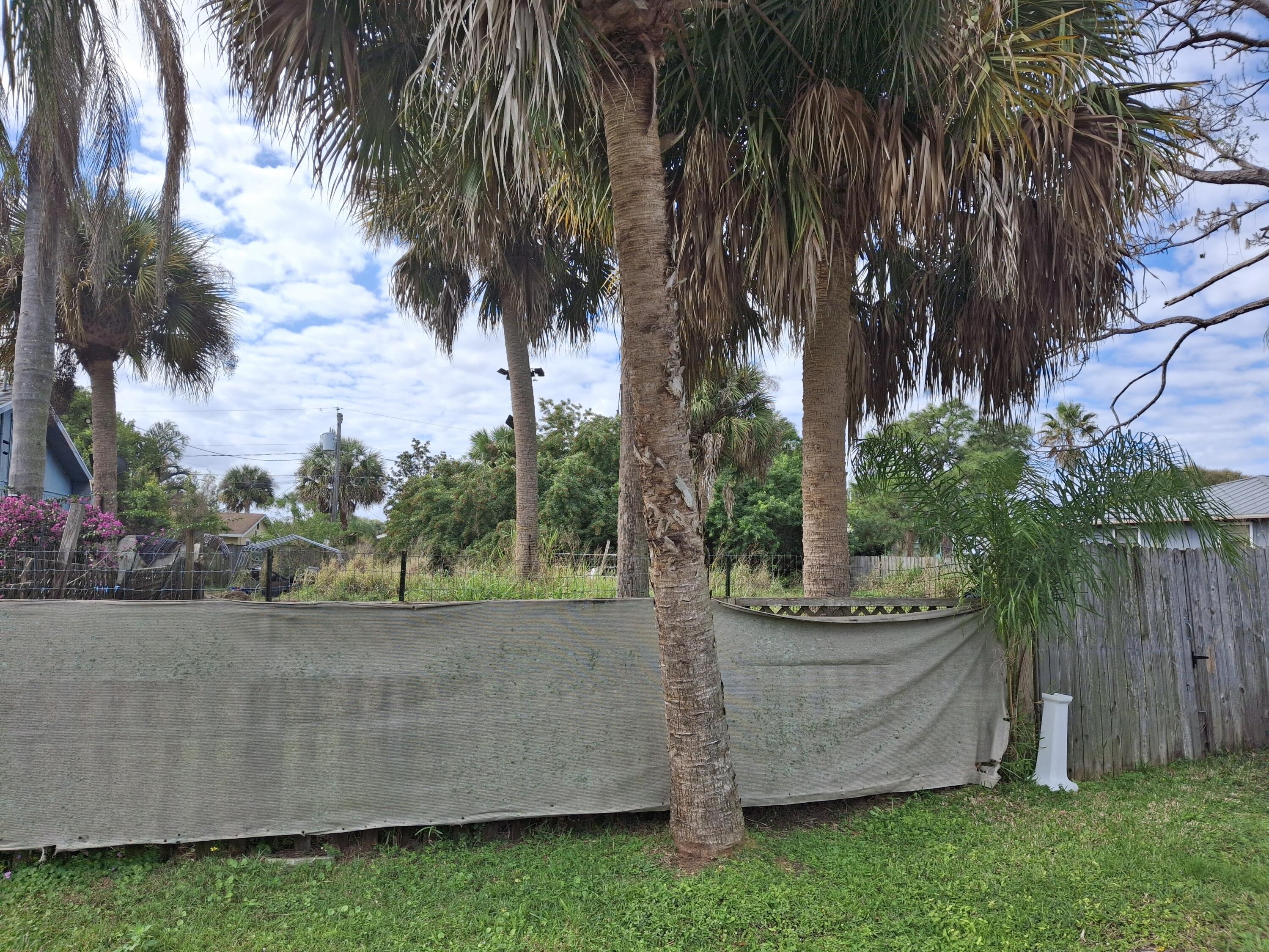 Undisclosed Address Fort Pierce, FL 34982 - Photo 1 of 2 a view of a backyard with plants