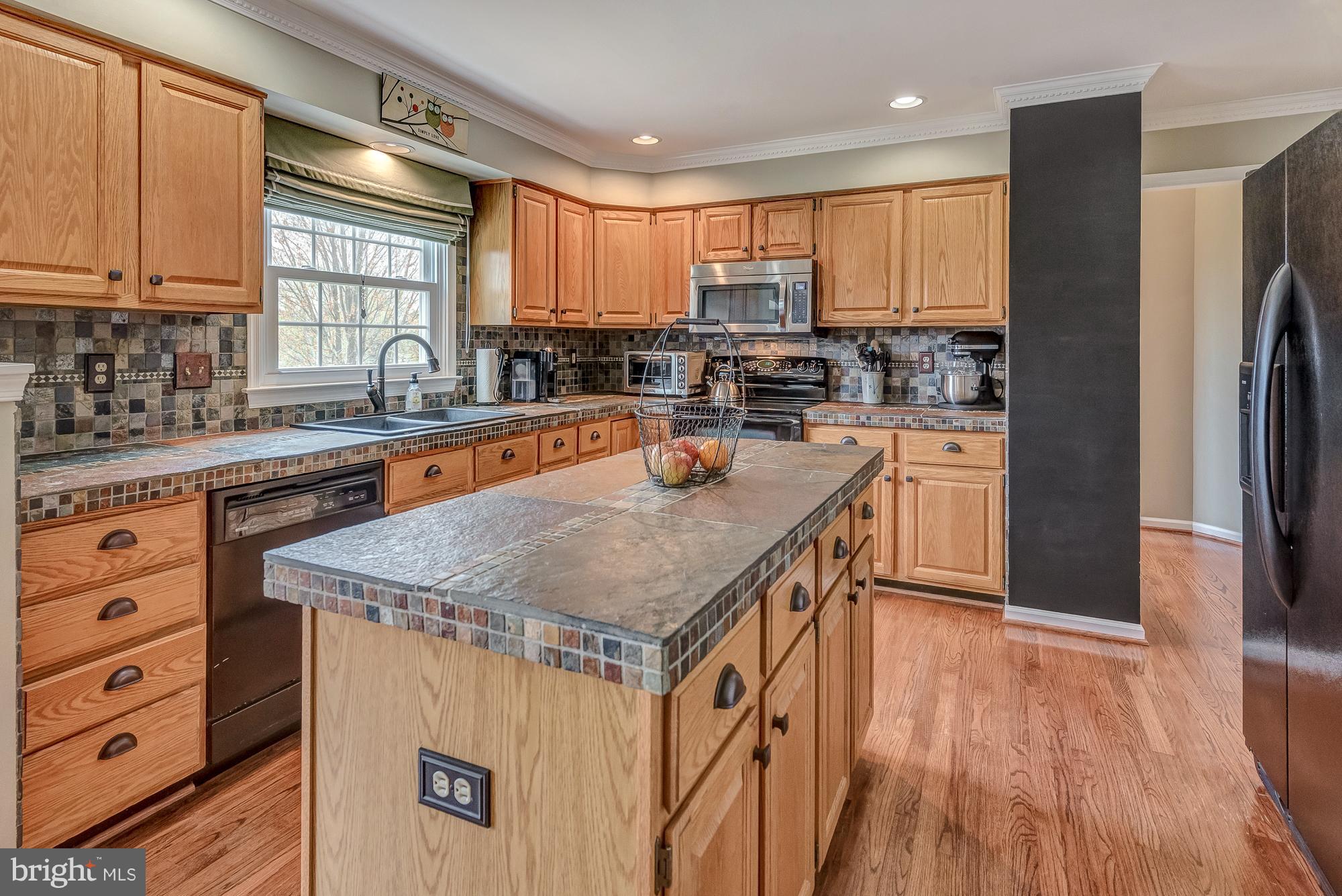 16902 Hoskinson Road Poolesville, MD 20837 - Photo 10 of 30 Custom stone counters and stainless appliances