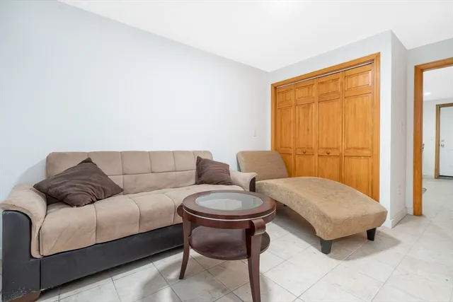 a living room with a couch and a table