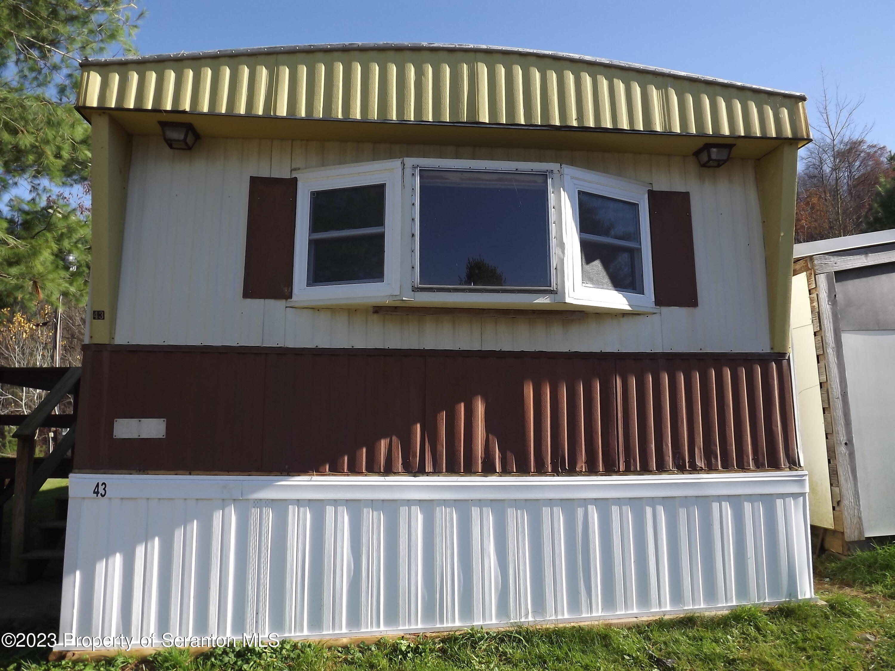 940 Nowlan Road, Unit 43 Port Crane, NY 13833 - Photo 3 of 13 a view of a house with a deck