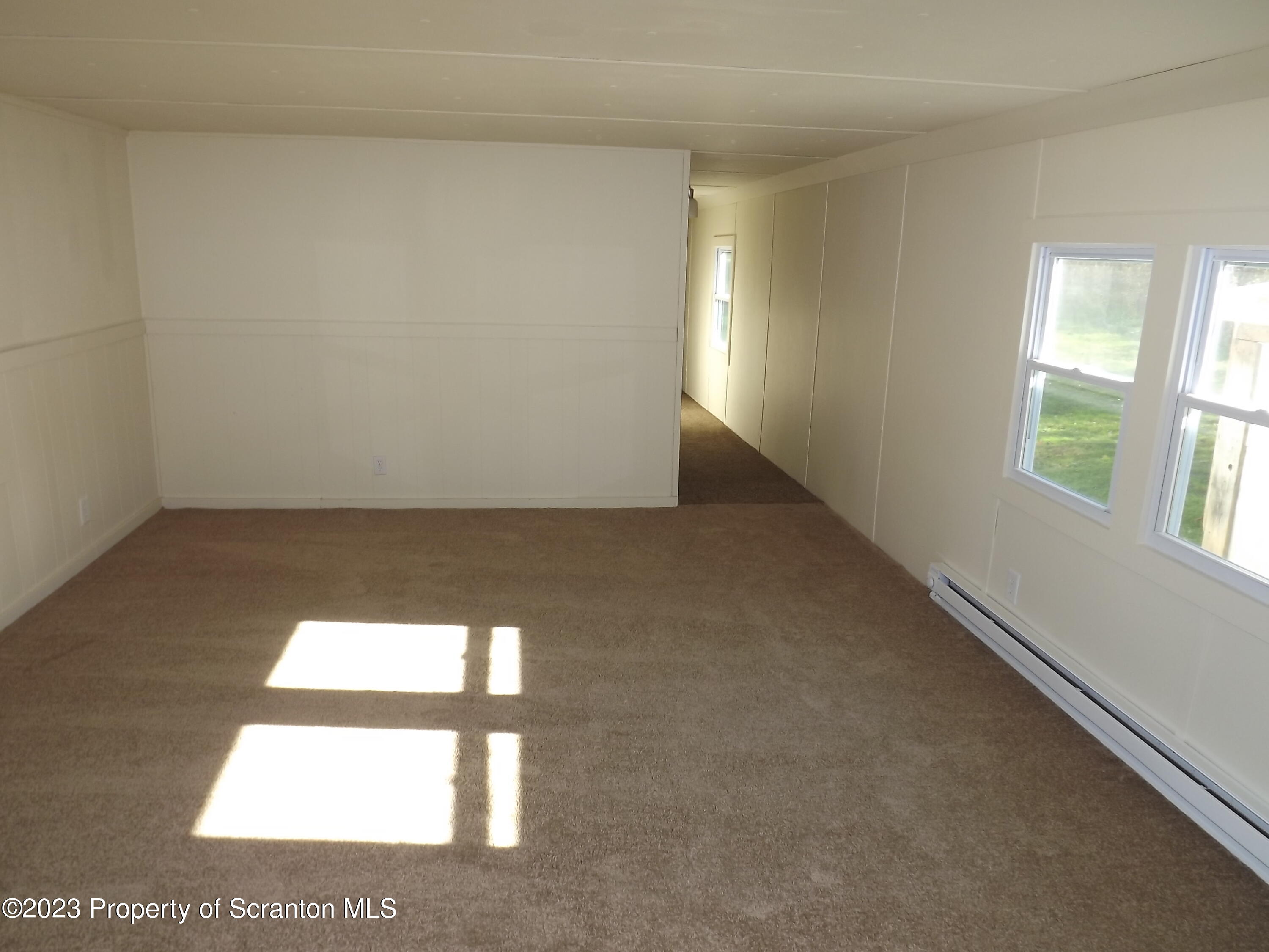 940 Nowlan Road, Unit 43 Port Crane, NY 13833 - Photo 8 of 13 a view of an empty room and window