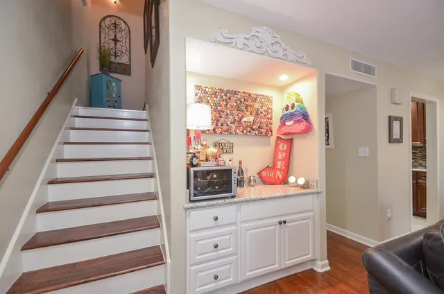 a view of storage and utility room with a window