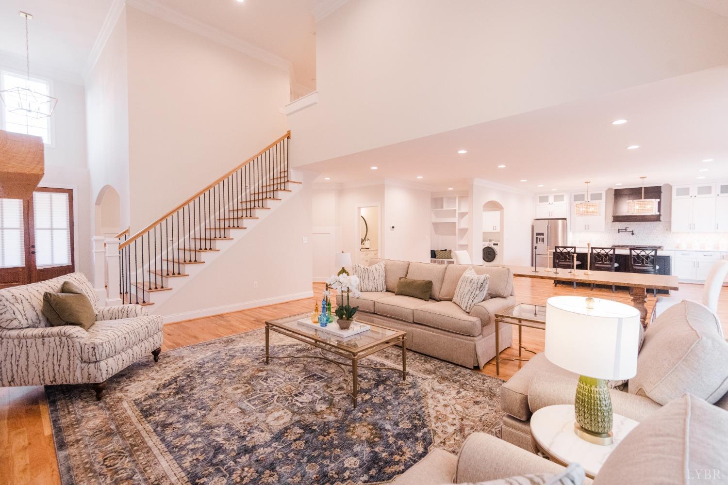 1401 Smartview Lane Forest, VA 24551 - Photo 14 of 46 a living room with furniture and a dining table with kitchen view