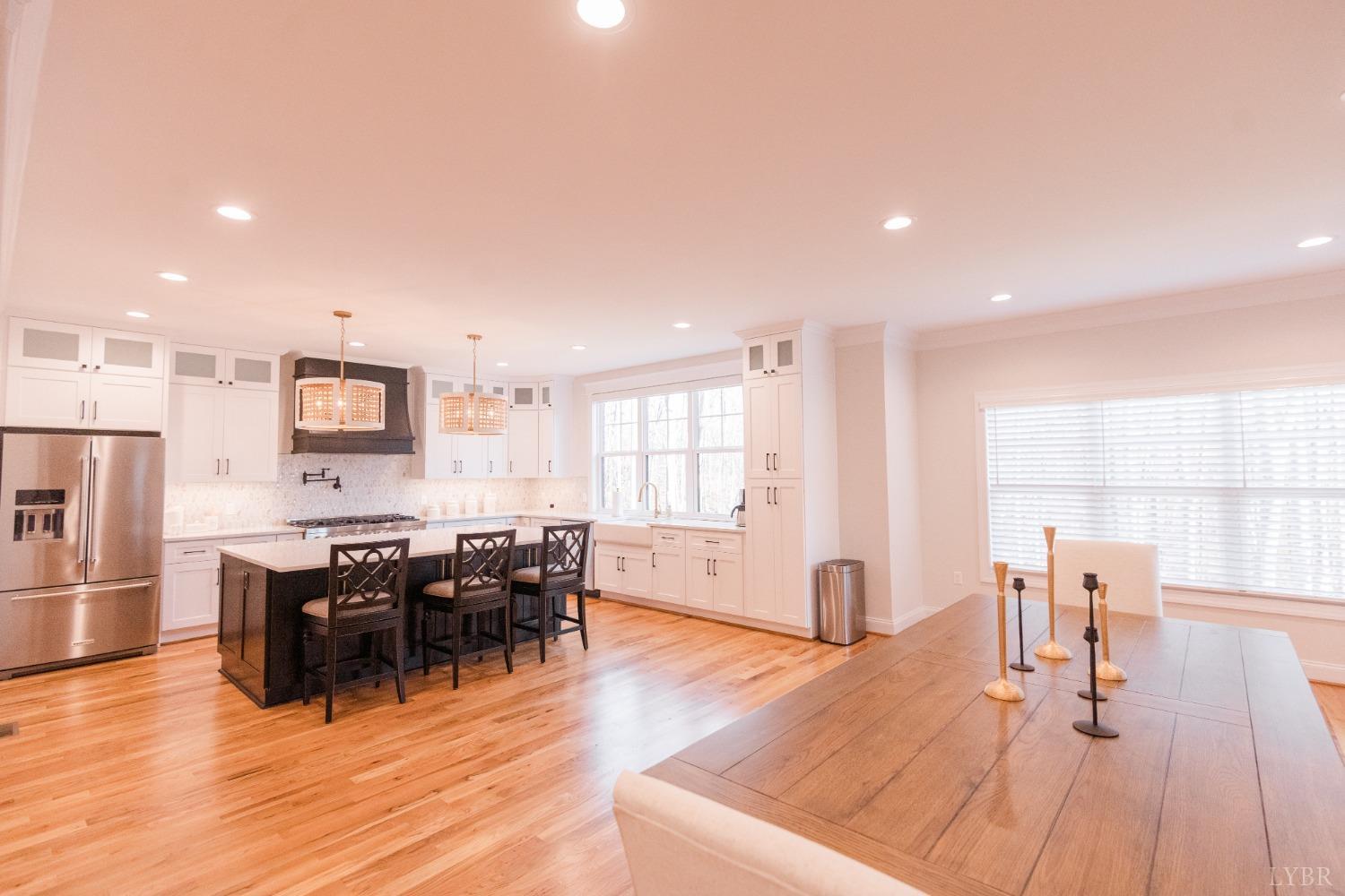1401 Smartview Lane Forest, VA 24551 - Photo 15 of 46 a living room with stainless steel appliances furniture and wooden floor