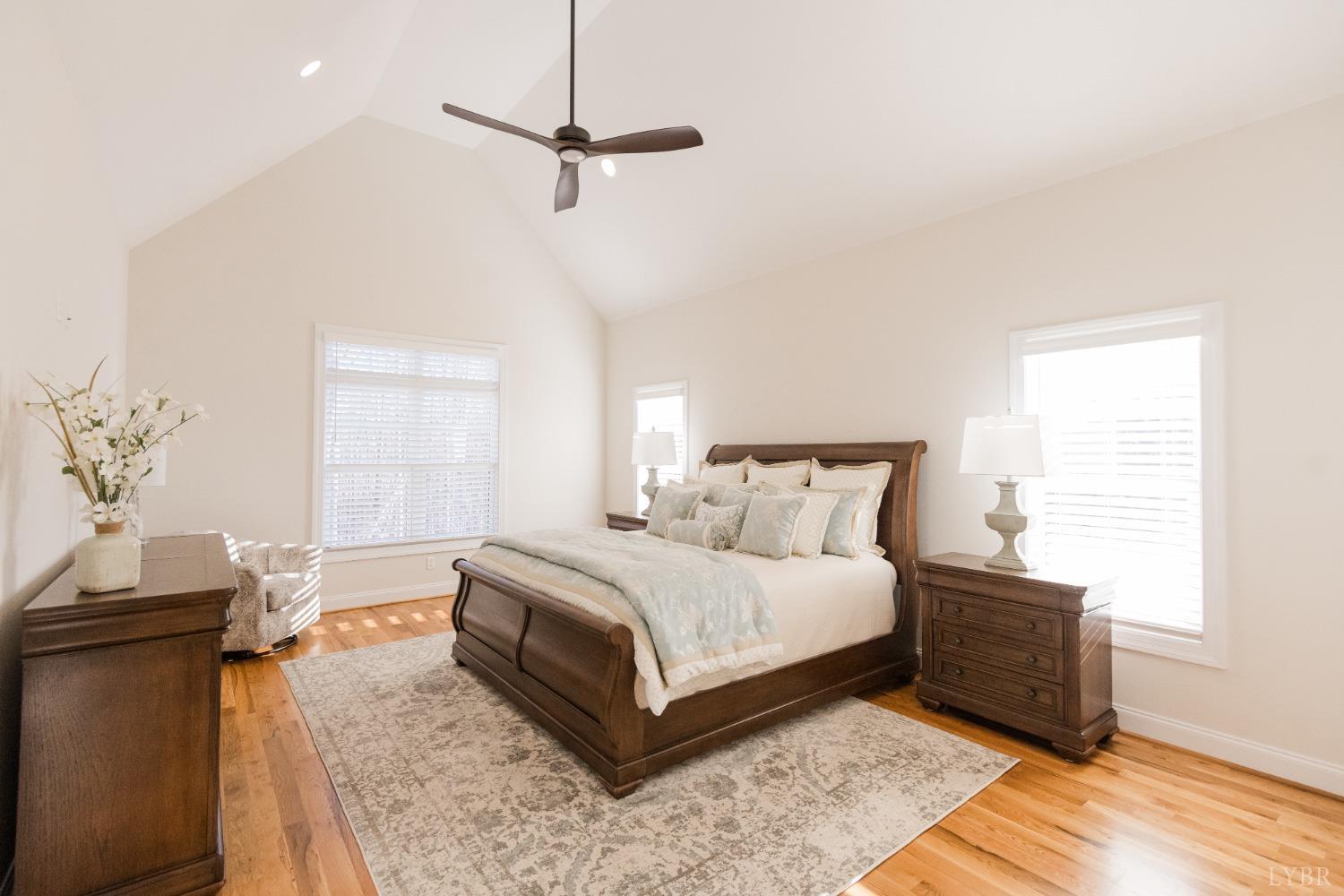 1401 Smartview Lane Forest, VA 24551 - Photo 21 of 46 a bedroom with a bed and wooden floor