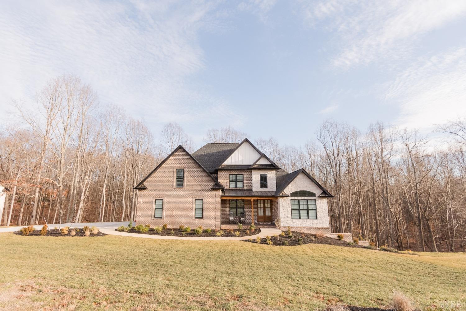 1401 Smartview Lane Forest, VA 24551 - Photo 3 of 46 a front view of a house with a yard