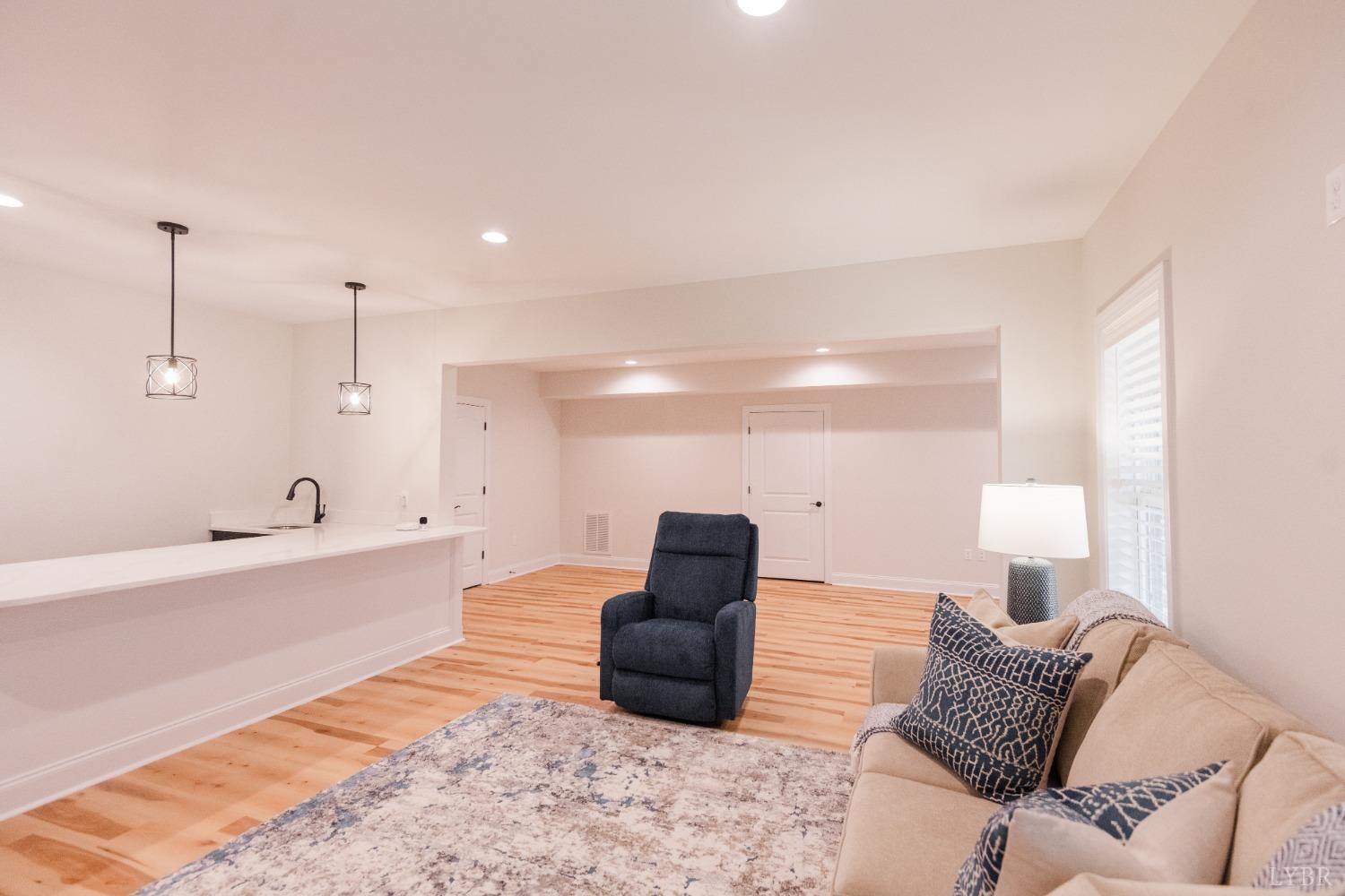 1401 Smartview Lane Forest, VA 24551 - Photo 37 of 46 a living room with furniture and a lamp