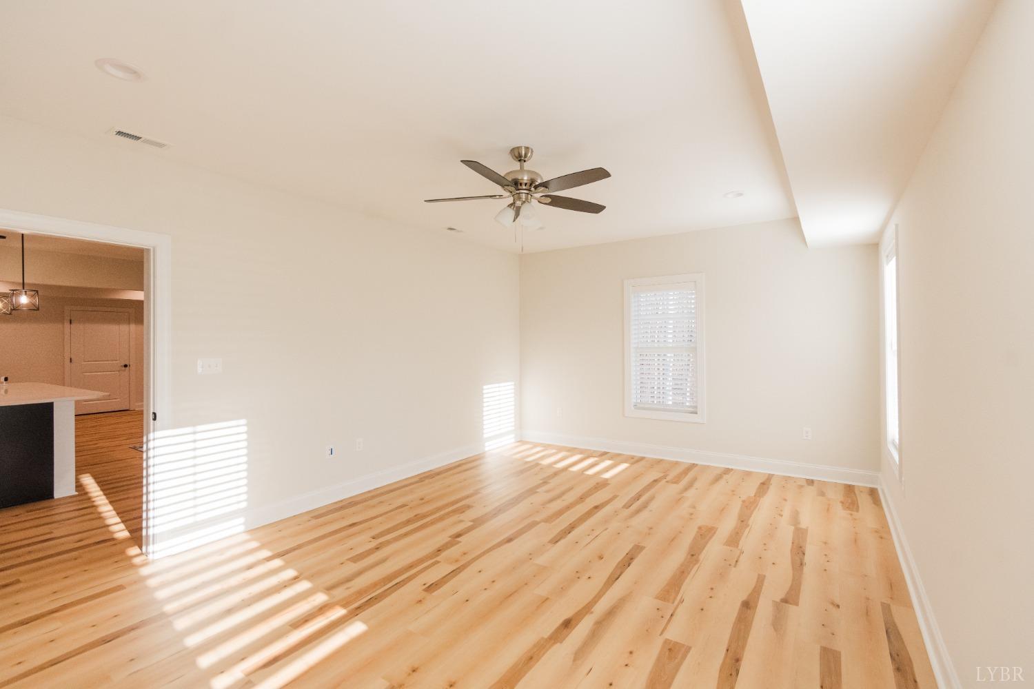 1401 Smartview Lane Forest, VA 24551 - Photo 41 of 46 a view of a room with wooden floor and a ceiling fan