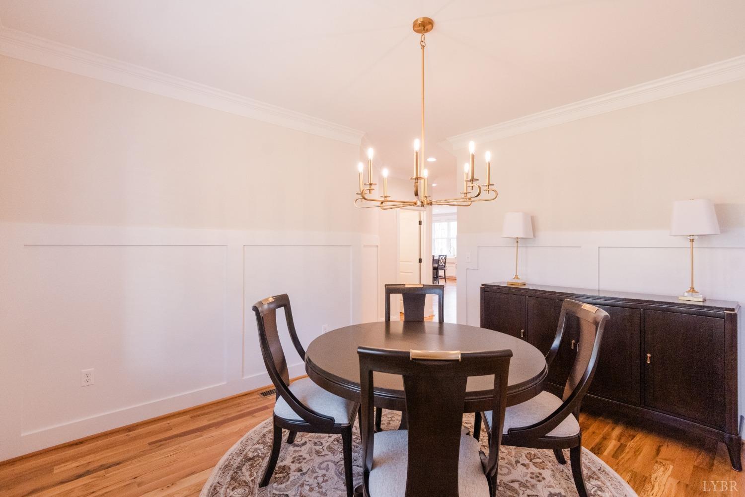 1401 Smartview Lane Forest, VA 24551 - Photo 8 of 46 a view of a dining room with furniture and wooden floor