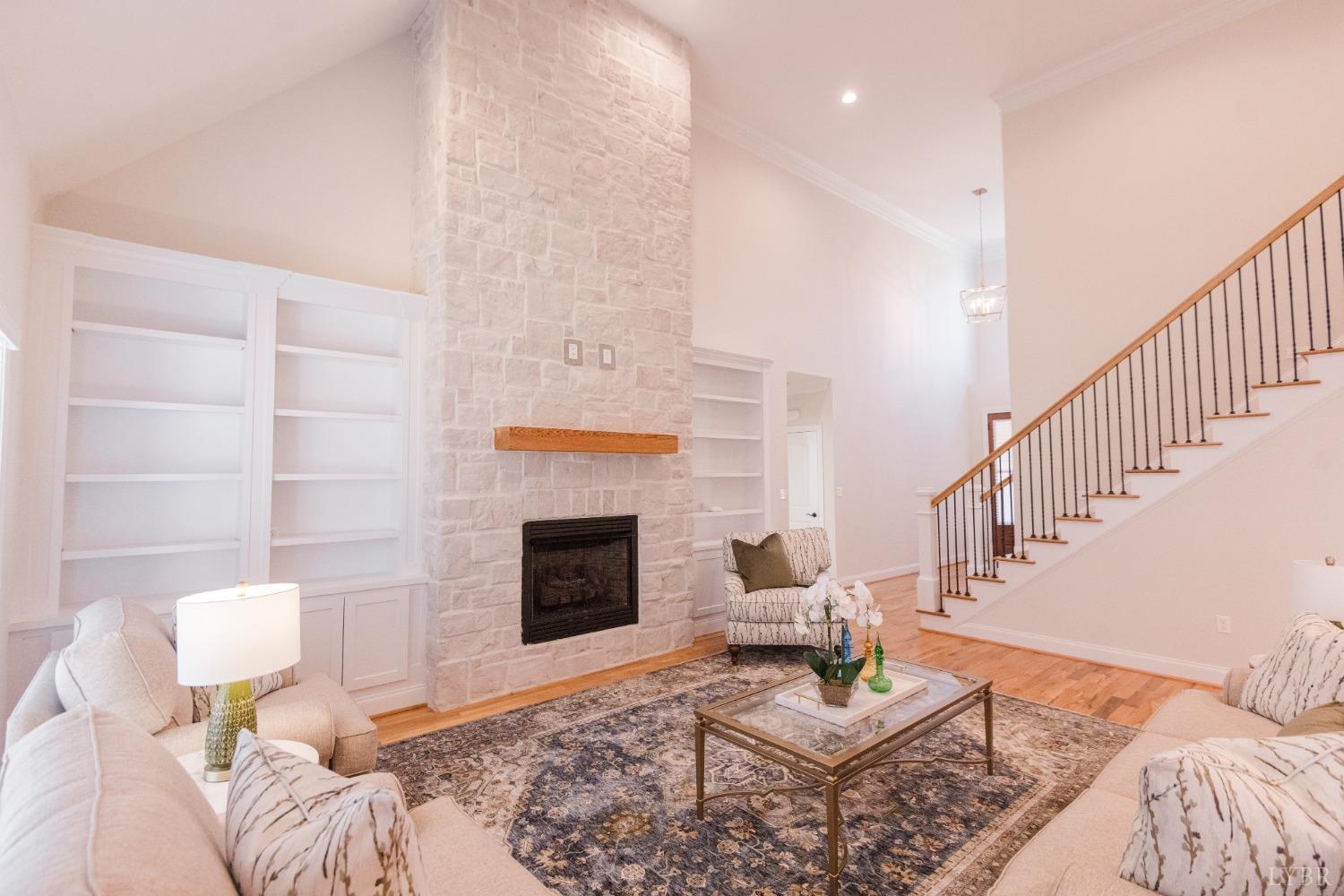1401 Smartview Lane Forest, VA 24551 - Photo 10 of 46 a living room with furniture and a fireplace
