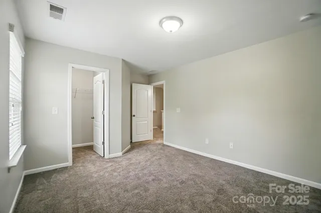 an empty room with an entryway