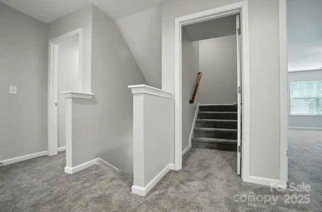 a view of an entryway with hallway