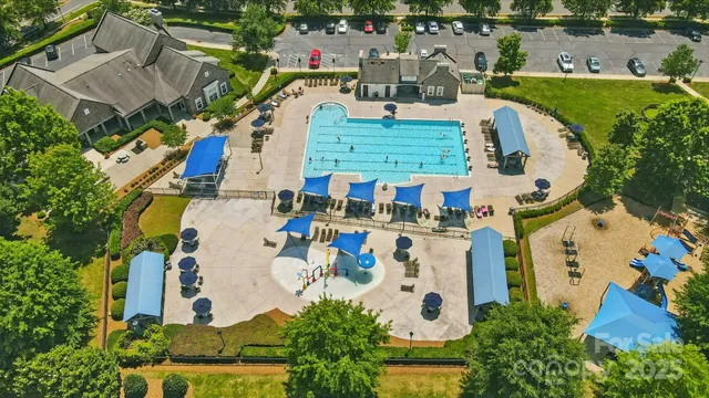 an aerial view of houses with outdoor space