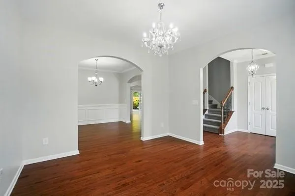 a view of a livingroom with wooden floor