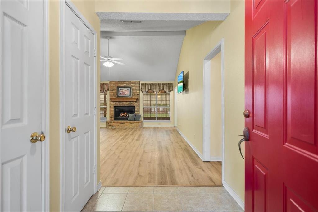 2824 Crestview Avenue Tyler, TX 75701 - Photo 4 of 39 a view of a hallway with wooden floor and staircase