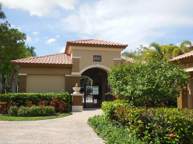 a view of a park with palm trees
