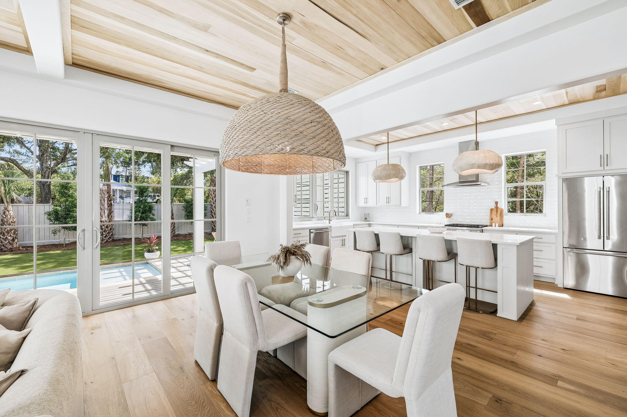 8 East Willow Mist Rd Inlet Beach Inlet Beach, FL 32461 - Photo 13 of 45 a view of a dining room with furniture large windows and wooden floor