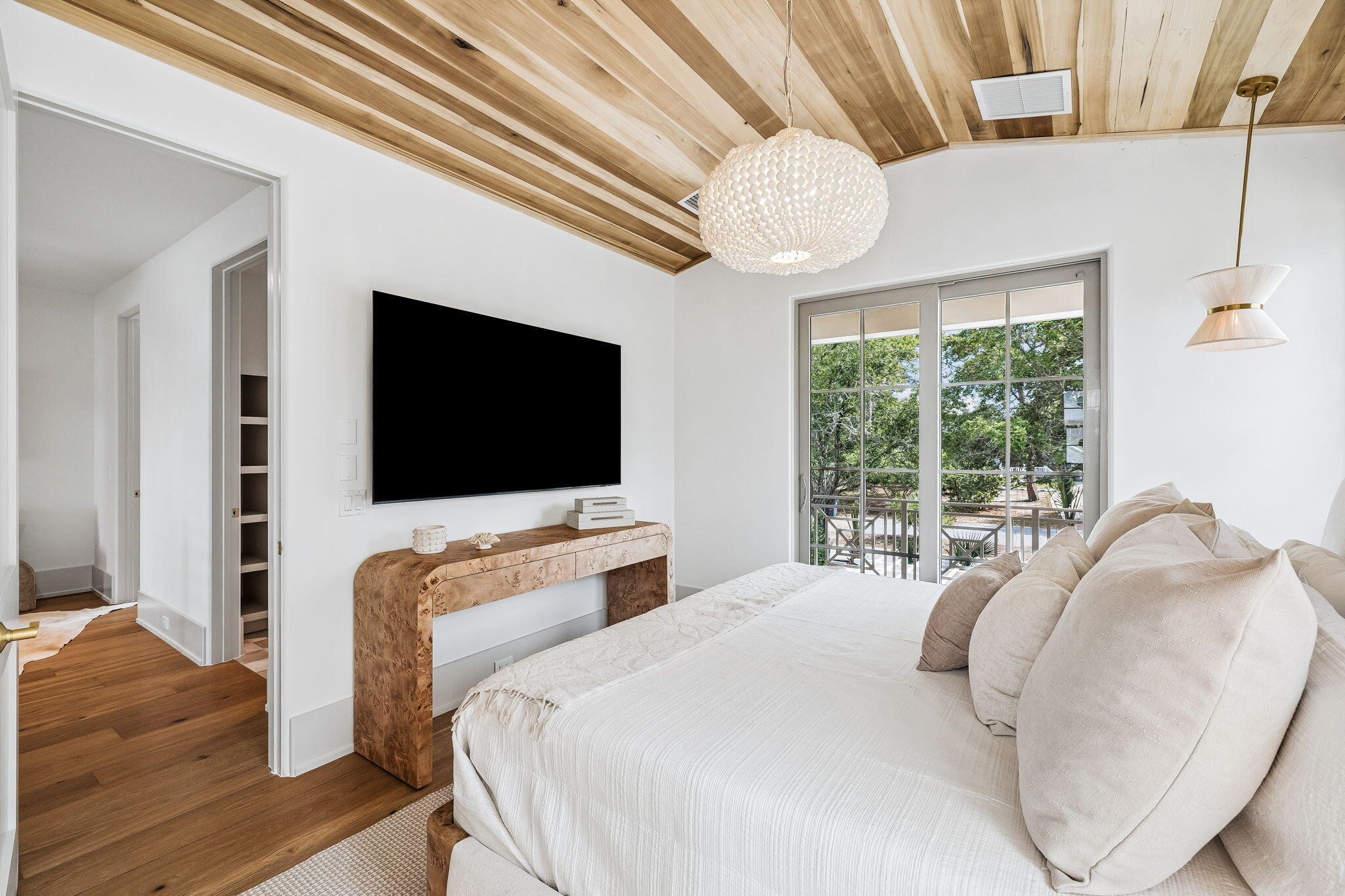 8 East Willow Mist Rd Inlet Beach Inlet Beach, FL 32461 - Photo 17 of 45 a bedroom with a bed and a flat screen tv