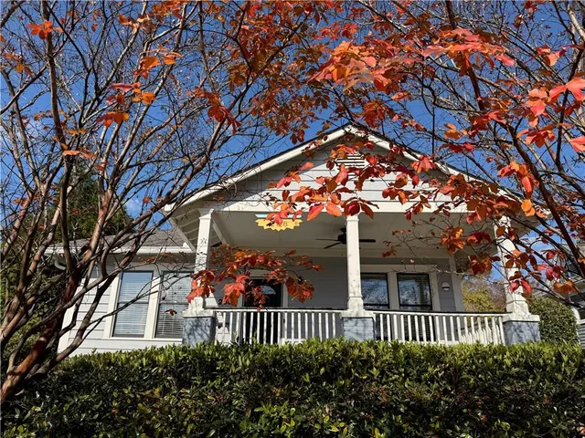 a view of a porch with a tree