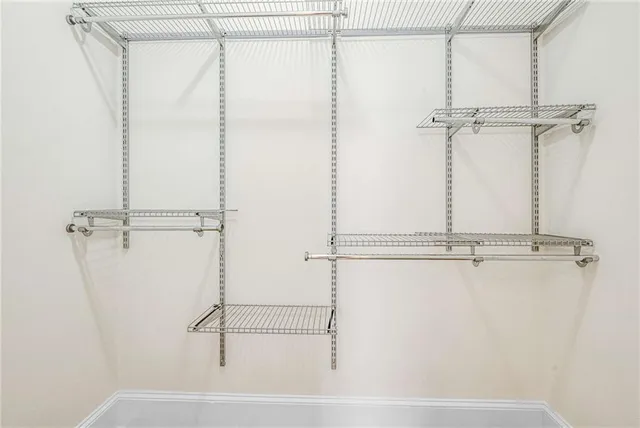 a bathroom with a shower and a shower