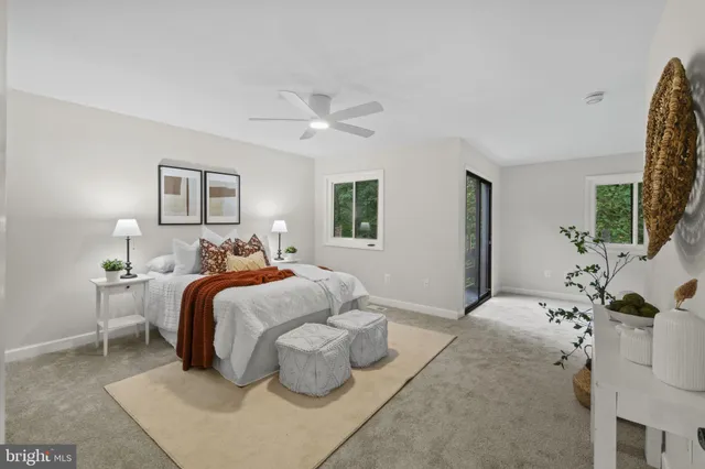 a bathroom with a double vanity sink mirror and