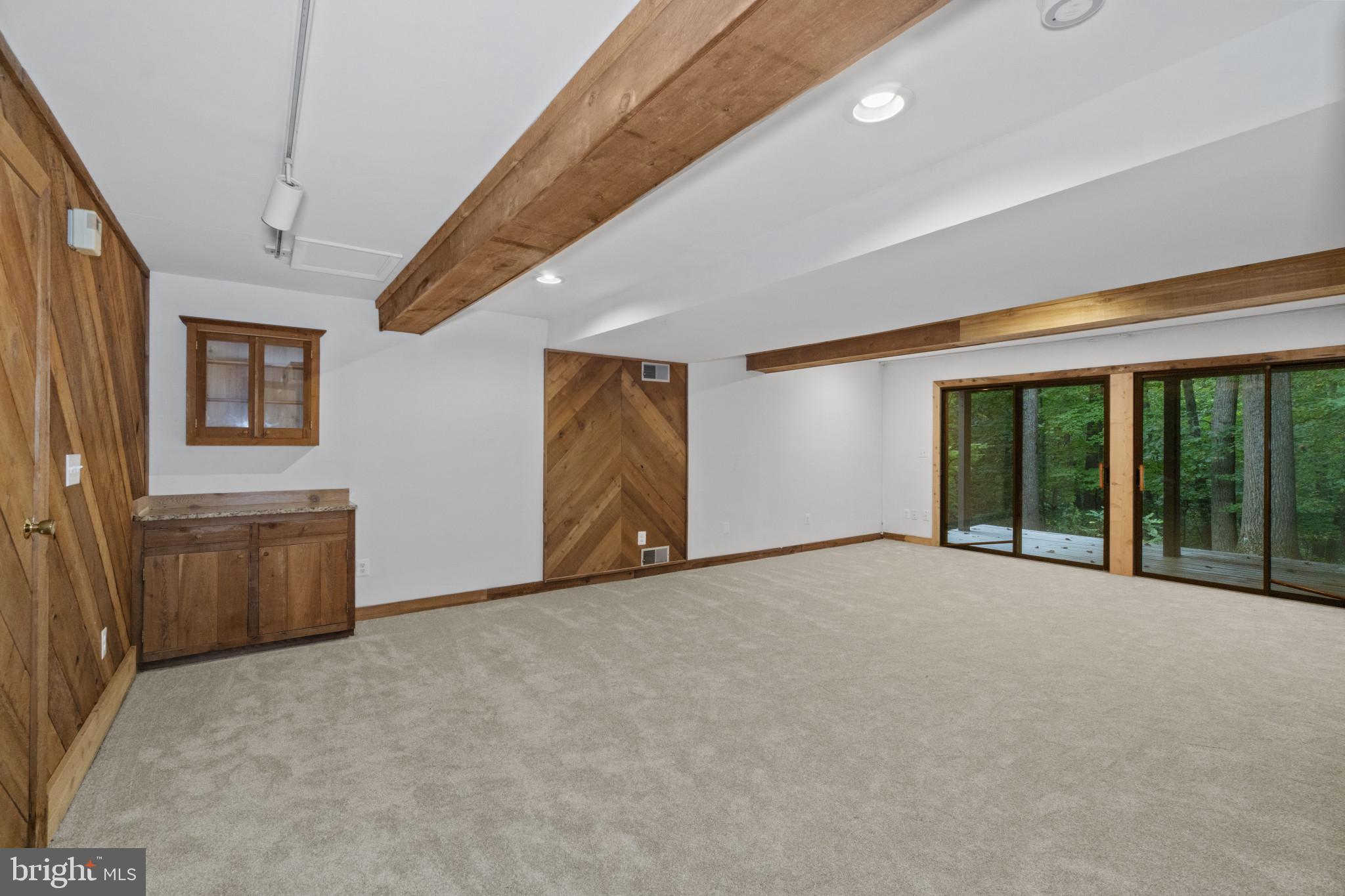 108 Beech Hill Lane, Unit 60 Baltimore, MD 21286 - Photo 20 of 27 a view of an empty room with a window