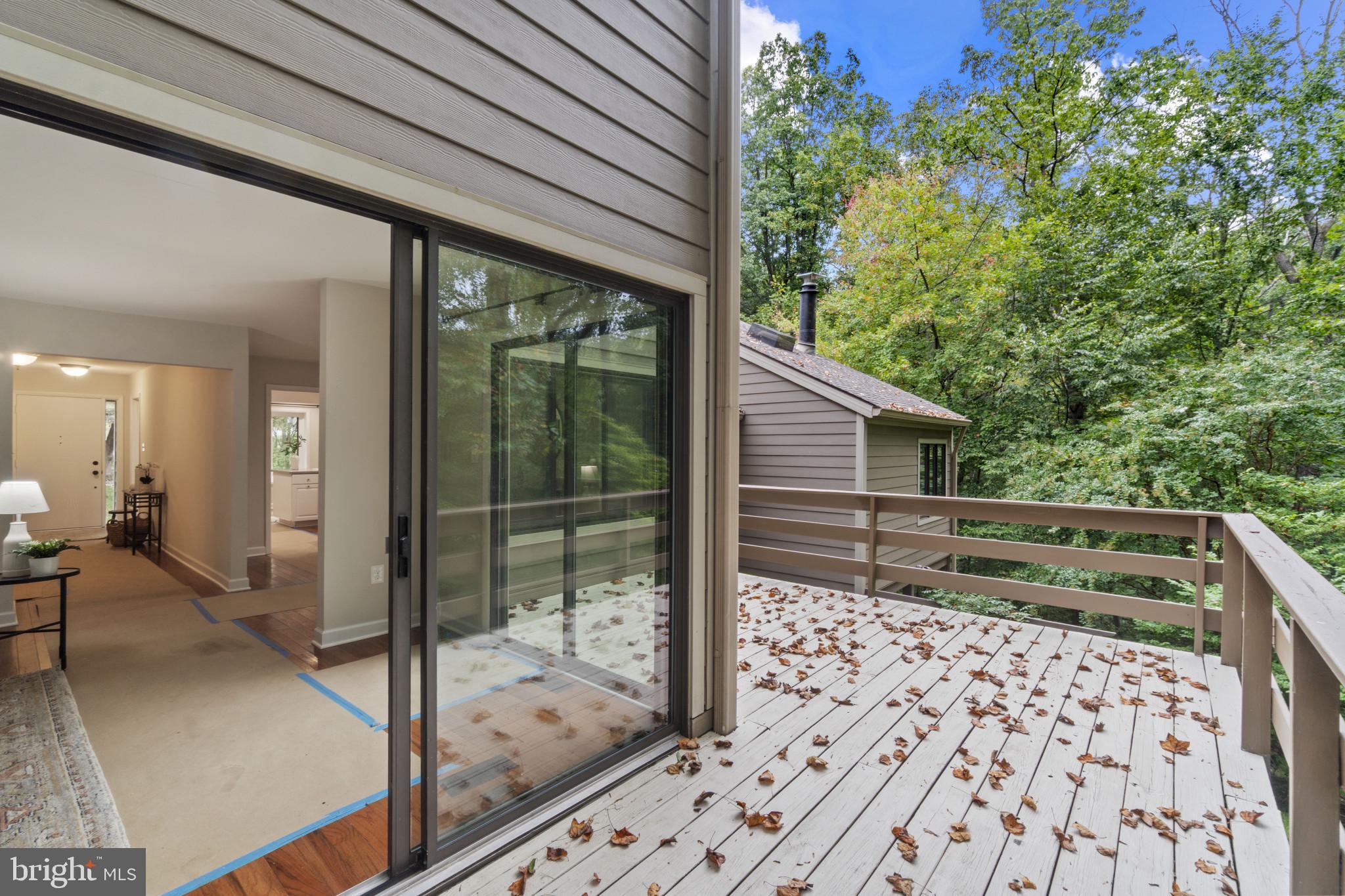 108 Beech Hill Lane, Unit 60 Baltimore, MD 21286 - Photo 21 of 27 a backyard of a house with a fountain